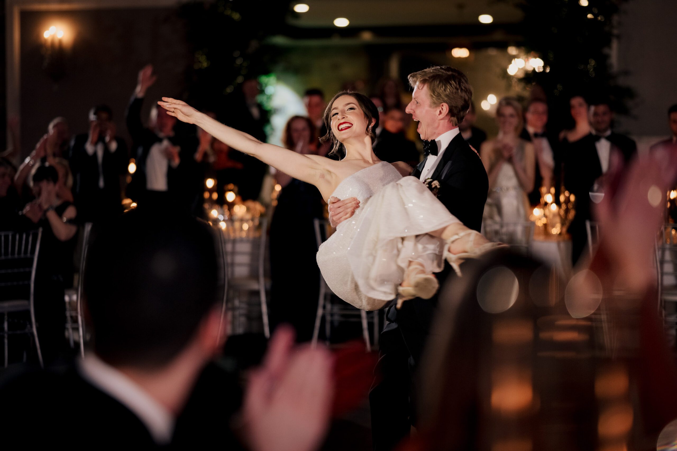 Bride and groom share a joyful laugh at their NJ wedding reception - candid wedding photography