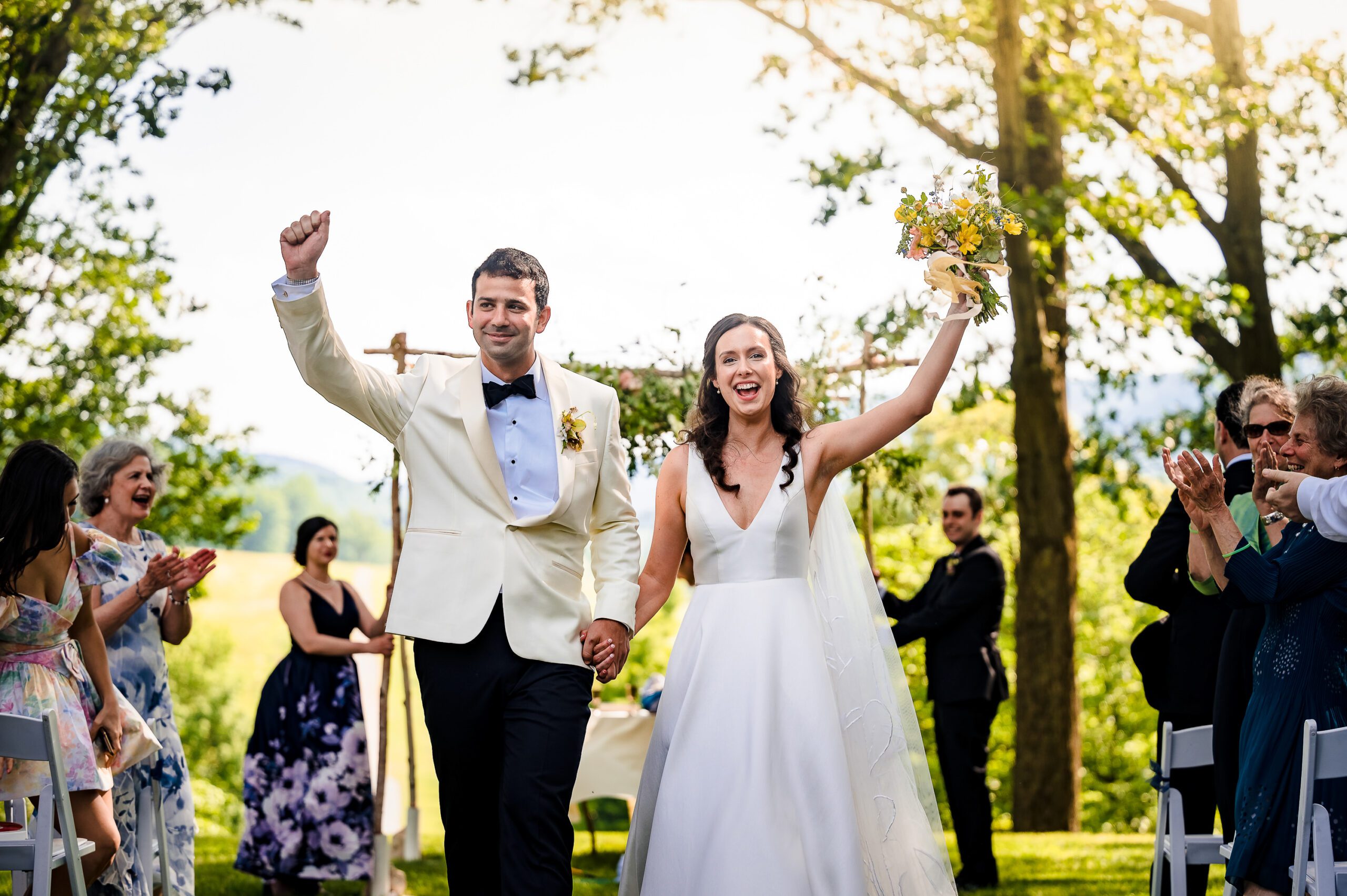 Smiling couple on their wedding day, showing the relaxed and natural moments captured in a stress-free timeline. (Ishan Fotografi, NJ Wedding Photographers)